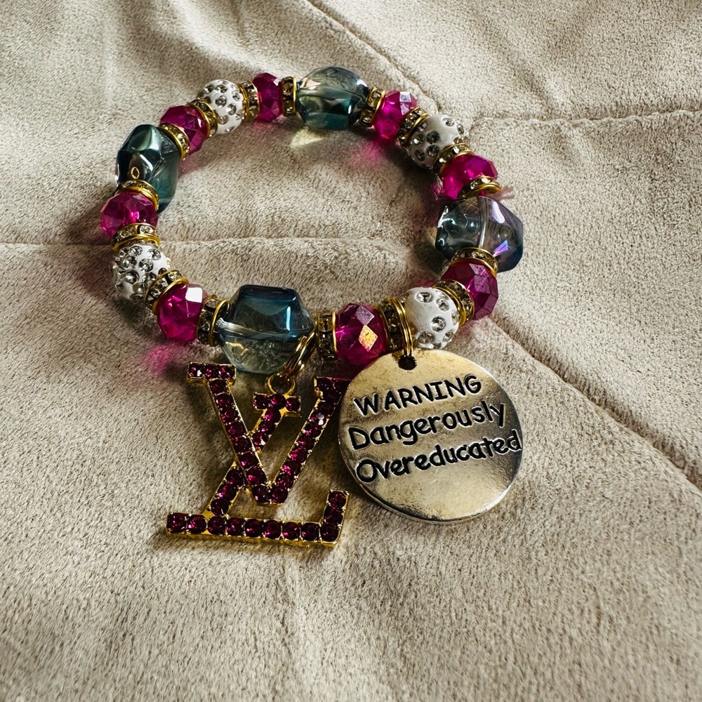 Pink and Gold Beaded Bracelet with Charms